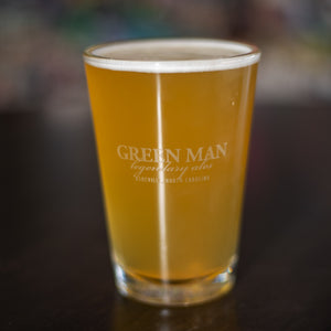 Green Man branded half pint glass
