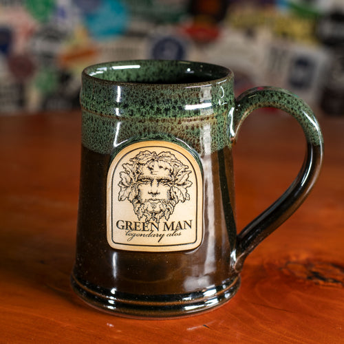 Green Man branded stoneware pottery mug