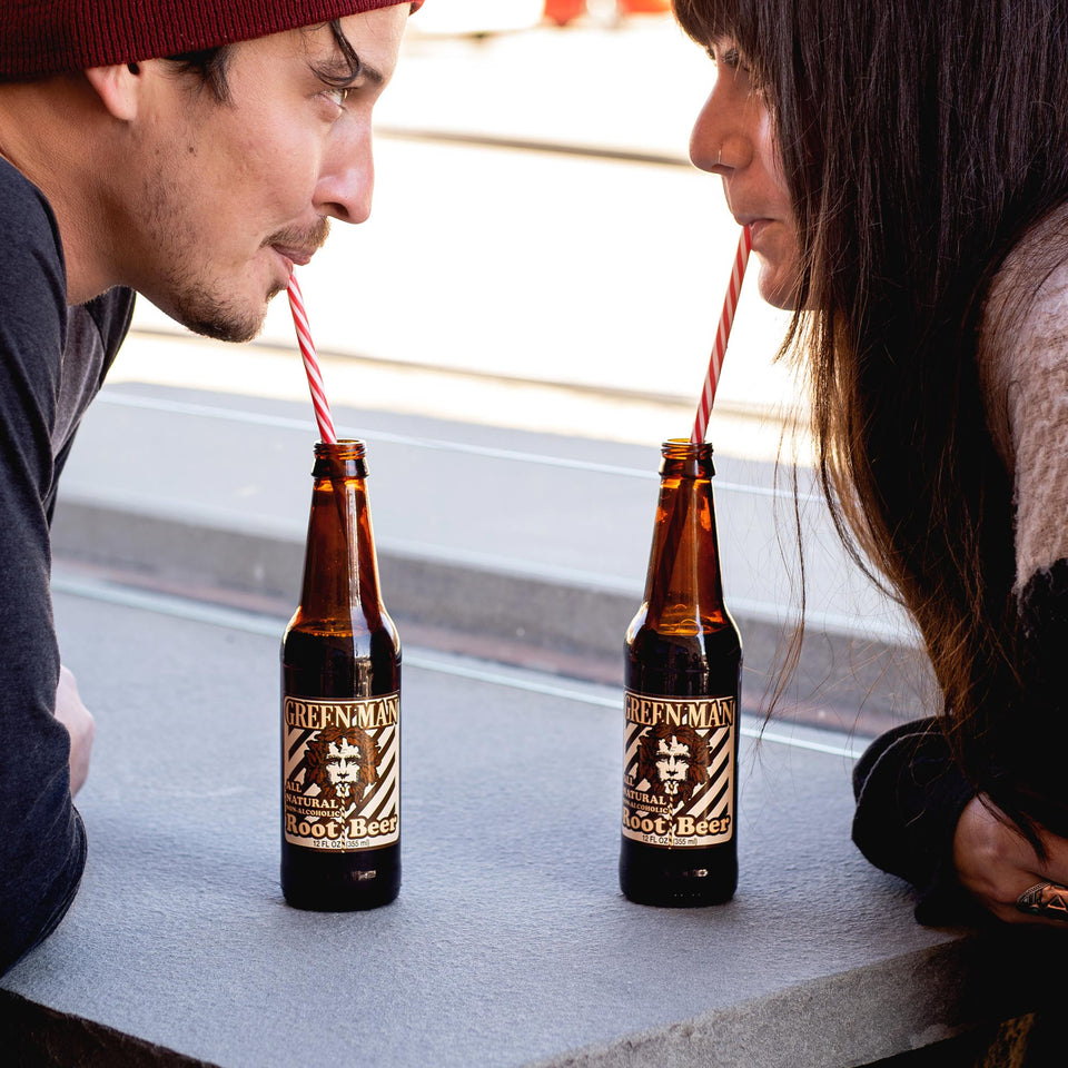 Couple enjoying Green Man All Natural Root Beer