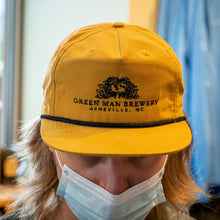 Load image into Gallery viewer, Green Man Yellow Snapback Peaking Logo hat Front detail

